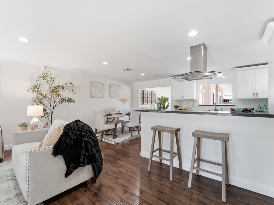 Upgraded kitchen with quartz countertops and breakfast bar